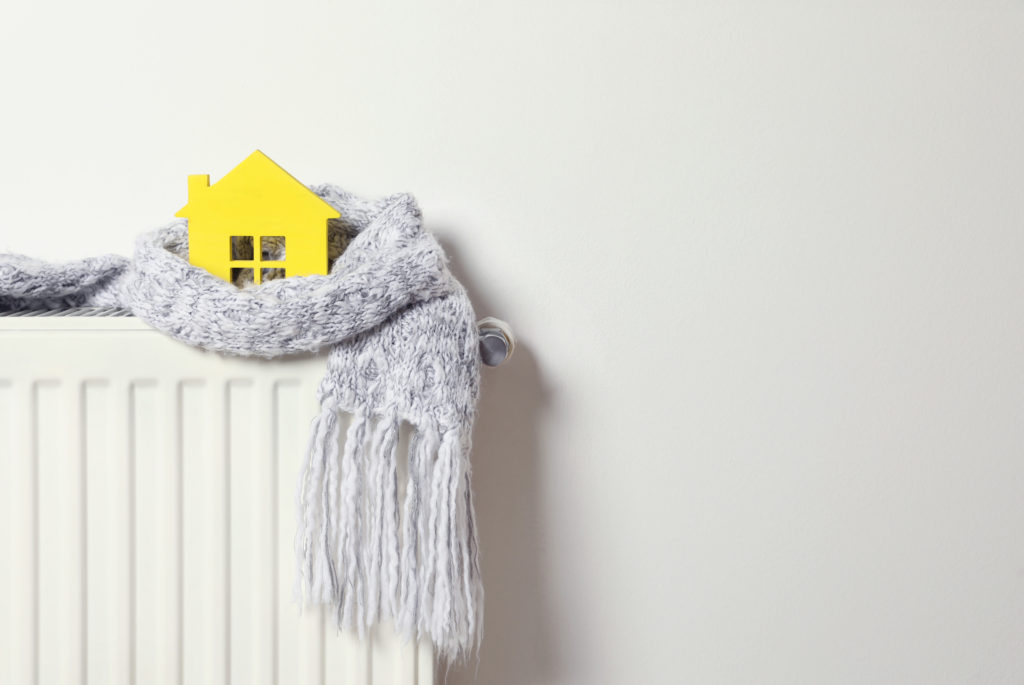 house wrapped in scarf on heater unit