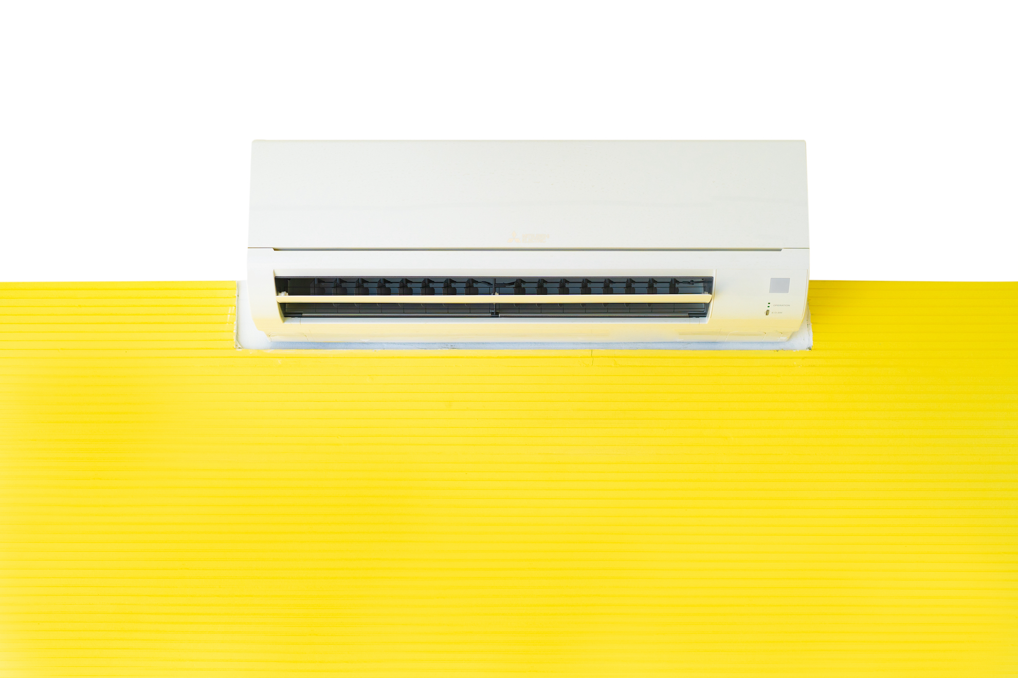 hvac on yellow and white wall
