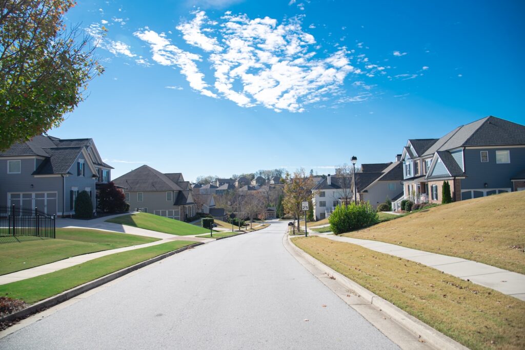 Modern subdivision down a hill with HOA