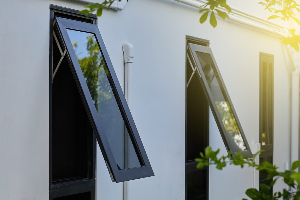 opened new windows on a warm summery day with black aluminum frames