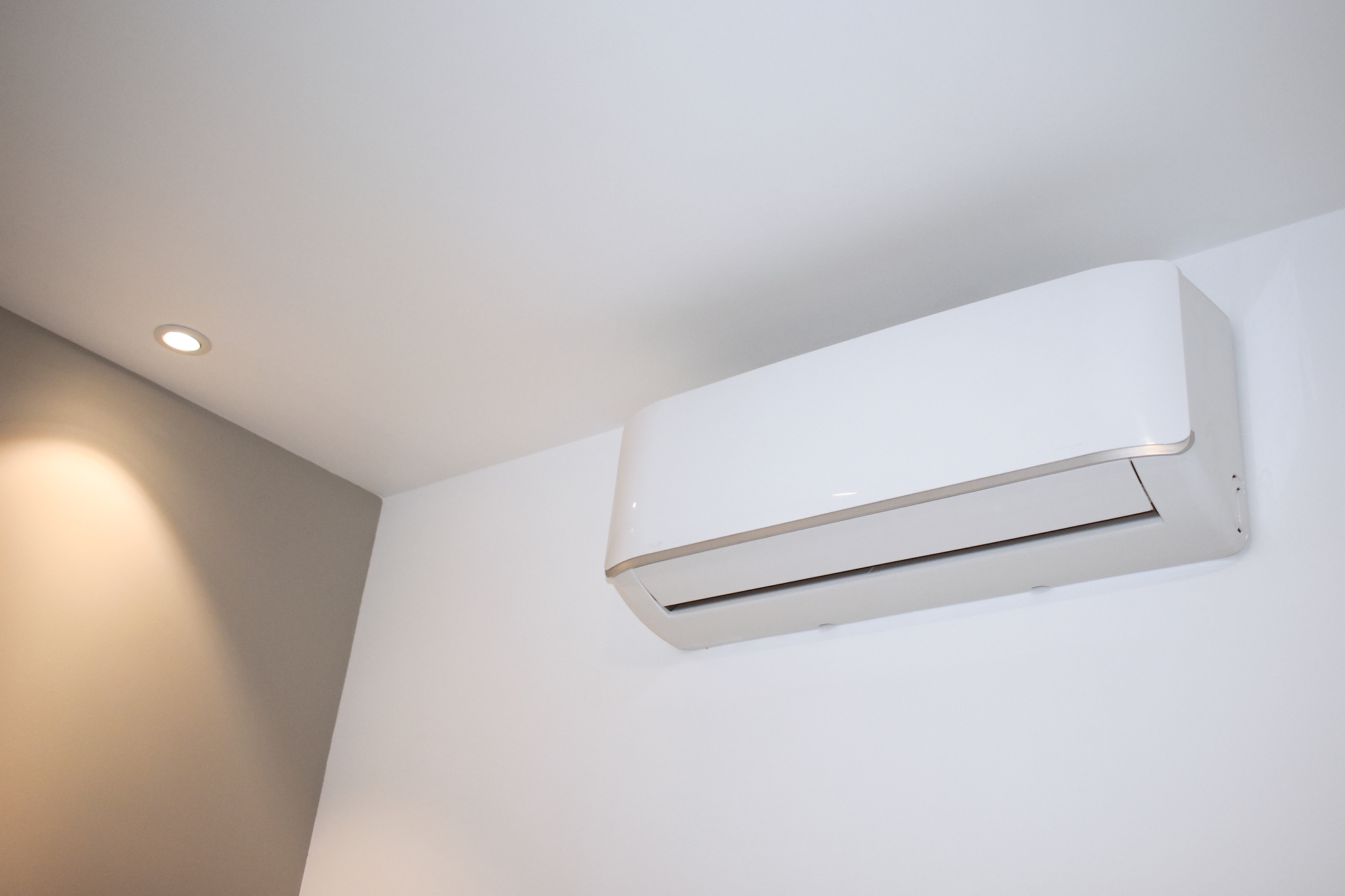 air conditioning unit on bedroom wall