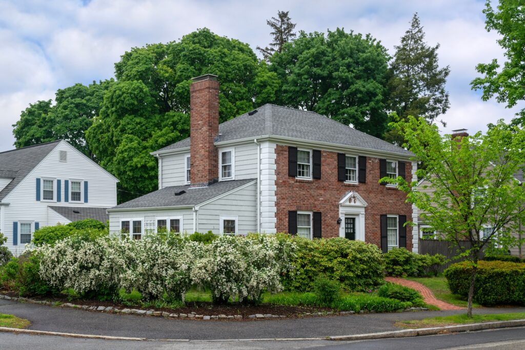 Beautiful two-story suburban house with decorative molding and timeless architectural design in Boston, Massachusetts, USA