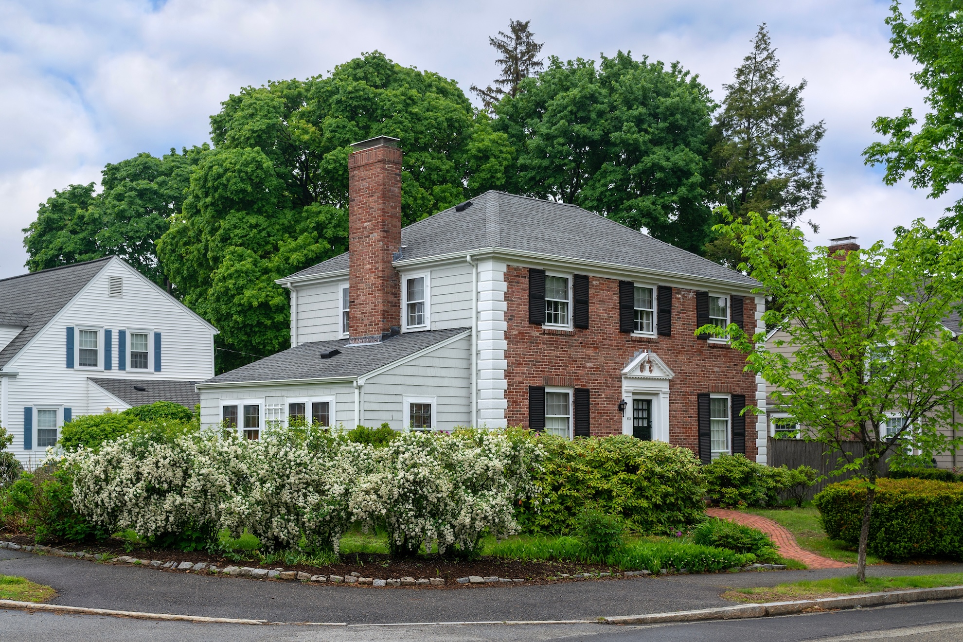 Beautiful two-story suburban house with decorative molding and timeless architectural design in Boston, Massachusetts, USA